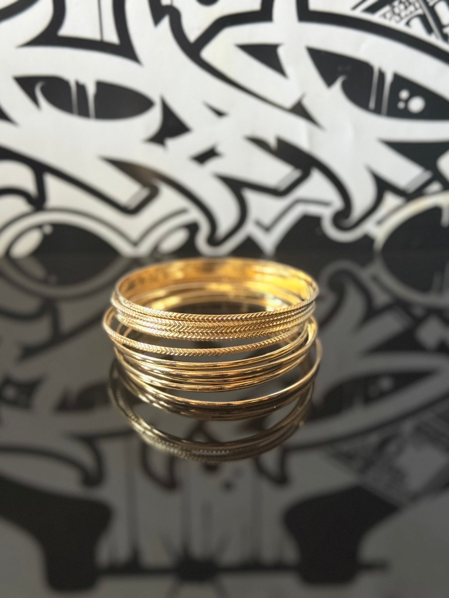 BANGLES (ARM HOOPS)